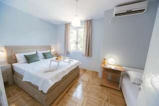 Апартаменты Explorer Podgorica Подгорица Трехместный номер Делюкс-6